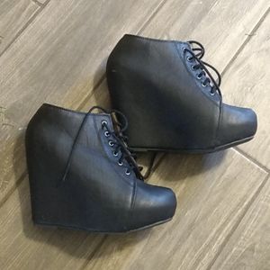 Black wedge boots
